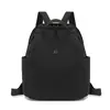 Mochila casual de color sólido minimalista estilo japonés, estilo artístico, adecuada para el uso diario y viajes al aire libre de las niñas, mochila versátil