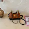 Bolso bandolera de un solo hombro personalizado, moderno y elegante, textura sencilla, nuevo bolso para mujer, bolso tipo cubo de moda para el verano 2026
