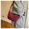 Bolso tipo bandolera informal de trabajo estilo coreano, bolsa tipo dumpling para mujer, nuevo de invierno 2025, alta calidad, textura, estilo extranjero, bandolera cruzada