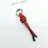 Nuevo llavero colgante ropa equipaje accesorios diy amantes cuerda de cuero simple creativo colgante para coche al por mayor