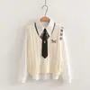 26056 Conjunto de dos piezas para mujer estilo universitario japonés dulce y juvenil, chaleco de punto con corbata de payaso + camisa blanca