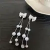 Brincos de pérola com laço de zircônia frescos e doces, brincos de franja com design de nicho, brincos com sensação de luxo leve e alta qualidade