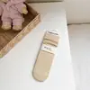 Calcetines de rayas verticales de color liso sin hueso para mujer, otoño, color Maillard, de media pantorrilla, de algodón, calcetines de felpa ins, calcetines de recuperación para mujer