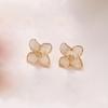 Aretes de flor retro estilo coreano con esmalte de gota, flor de cuatro pétalos, moda de alta gama para mujer, exquisitos aretes de aleación de flor de cuatro hojas, aretes netos rojos