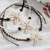 Estilo de férias boêmio flor de concha trançada corda de contas de madeira ajustável colar feminino joias atacado
