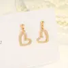 Pendientes Huecos de Amor de Zirconio Nuevos para Mujer Simple Corea del Sur Ins Diseño de Nicho Tachuelas Moda Pendientes Elegantes