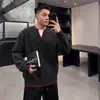 Nuevo suéter de punto de moda para otoño e invierno, talla grande para hombre, casual, versátil, corte holgado, imitación de dos piezas