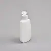 Suministro de fábrica botella plana de plástico de 130 ml botella exprimible para loción material HDPE botella exprimible para protector solar crema de manos