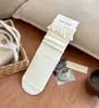 Meias de renda com babados de comprimento médio para outono e inverno no atacado, meias femininas de cor sólida estilo faculdade japonesa