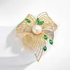 Novo broche estilo antigo de alta qualidade ins para mulheres estilo chinês leque borla pino de terno placket de pressão cheongsam corsage atacado