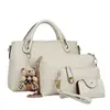 Bolso de mano para mujer verano nuevo conjunto de cuatro piezas bolso de madre bolso de hombro de oso bolso de mujer primera generación de pelo