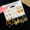 Nuevo Juego de Pendientes de Estilo Europeo y Americano con Rayas Trenzadas, Diseño Retro Geométrico, Sensación Simple y de Alta Gama, Juego de Pendientes de Botón de Nueve Piezas para Mujer