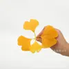 Comércio exterior venda quente alta qualidade planta verde simulação folha de ginkgo DIY guirlanda feita à mão buquê decoração de chapéu de estudante acessórios material