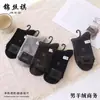 Calcetines de lana para hombre nuevos otoño e invierno negocios acolchados cálidos tubo alto calcetines de algodón para hombre letras absorbentes de sudor transpirables mayoreo