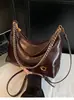 2026 Nova Bolsa de Axila de Couro Wax Oiled Retro para Mulheres Grande Capacidade para o Dia a Dia Corrente Ombro Único Transversal Versátil Bolsa Dumpling