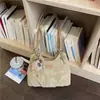 Bolso de axila de gran capacidad para mujer, modelo nuevo 2026, bolso de hombro versátil para el trabajo diario, bolso tote de nicho estilo coreano