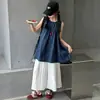 Conjunto de Dos Piezas Estilo Artístico para Niñas Verano 2026 Nuevo Camisa de Muñeca Calada para Niños y Pantalones de Pierna Ancha Estilo Delgado Venta al por Mayor