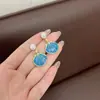 Pendientes de verano franceses frescos retro de concha de perla personalidad europea y americana elegante diseño delicado joyería para orejas versátil