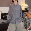 Camisa de manga larga a rayas con cuello de solapa para mujer, estilo commuter de principios de otoño, nueva moda 2026, top versátil de corte holgado con un aire elegante