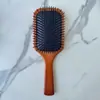 Pente quadrado grande de madeira de faia estilo Aivanada, atacado para uso doméstico, pente com almofada de ar para alisar o cabelo, com gravação