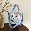 2026 Nuevo Estilo Bolso Cruzado de un Solo Hombro Estilo Coreano Estilo Ins Lindo Dibujo Animado Bolso de Lona para Mujer Gran Capacidad Bolso Cubo para Viajes