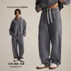 Moda Masculina Estilo Corrente Fornecimento Direto de Calças Retas Vintage Lavadas de Algodão Puro para a Primavera de 2026.