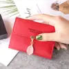 Nueva cartera pequeña femenina corta estudiante moda coreana pequeña fresca hoja tres pliegues hebilla monedero tarjetero mayoreo