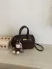 Moda transfronteiriça de alta qualidade bolsa de platina de mão bolsa feminina nova bolsa Kelly retrô de nicho para o dia a dia bolsa de ombro transversal
