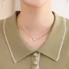 Suéter de punto de manga larga con cuello, estilo mom, moda otoño/invierno 2026, diseño nuevo, corte holgado, elástico y adecuado como capa base para mujeres de mediana edad