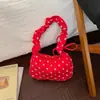 Bolsa de mano tipo bolsa de dumplings coreana, bolsa de mano de tela de pana, nueva colección primavera 2026, bolso de hombro casual de lunares, bolsa versátil para el antebrazo