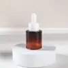Botella gotero marrón a prueba de luz de peso ligero al por mayor personalizada para aceite esencial, cosméticos medicinales, botella de aromaterapia