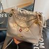 Bolso de cadena con rombos para mujer 2023, nuevo diseño de nicho, bandolera de hombro, popular en línea, bolso de cubo de alta calidad.