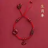 Tornozeleira de Fio Vermelho com Doze Signos do Zodíaco em Cinábrio Novo Estilo 2023 Pulseira com Fivela de Paz Ornamento de Corda de Pé Trançada com Ano de Nascimento com Acabamento de Alta Qualidade