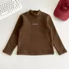 Valle del Viento 2026 Invierno Nuevo Estilo Coreano Elegante Cuello Alto Medio Estampado de Letras Camiseta Base Cálida Versátil Ropa Interior para Niños