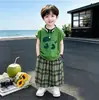 Conjunto de Ropa de Verano para Niños 2026 Nuevo Elegante Chaleco de Cachorro de Dibujos Animados Pantalones a Cuadros Anti-Mosquitos Conjunto de Dos Piezas