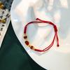 Nuevo colgante de calabaza Yuan Bao de cuerda roja tejida a mano estilo chino Joyería Nuevo Cuerda de mano ajustable de la suerte para hombres y mujeres