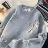 Top unisex retro americano desgastado rasgado otoño e invierno suelto extragrande estilo casual de alta gama único primavera y otoño