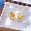 Anillo de Oro Arena Antigua de Alta Retención de Color Anillo Abierto de Flor Hueca Exquisito Nicho Dulce Versátil Anillo de Tendencia Nacional