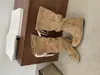 []2026 novas botas femininas de cadarço com laço, botas longas de bico redondo, botas de camurça emagrecedoras da moda