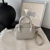 Bolso pequeño de alta gama de moda para mujer, nuevo bolso popular de hombro y cruzado de moda de otoño 2026