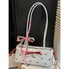 Bolso de axila único y sofisticado con lazo para mujer, nuevo bolso baguette estampado, moderno, fresco y dulce bolso de hombro