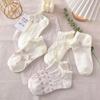 Meias femininas atacado primavera e verão Zhuji estilo colegial boca bolha meias brancas estudantes japonês doce casual meias de algodão