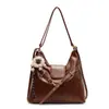 Bolso de Hombro Vintage de Gran Capacidad de Gama Alta para Mujer 2025 Primavera Nuevo Moderno Versátil Mochila Bolso Cruzado Multiusos Moderno