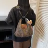 Mochila super popular de nicho com estampa de leopardo para mulheres, nova mochila escolar estudantil da moda 2026, bolsa de ombro de grande capacidade para o dia a dia
