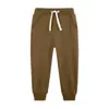 Novedad Otoño Pantalones Deportivos Jogger para Niños Estilo Europeo y Americano 2026 Color Sólido Versión Lisa para Niños Mayores Pantalones Largos de Felpa Pantalones Deportivos