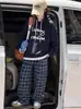 Sudadera con capucha para niña 2026 Otoño Nueva Elegante Mediana a Grande Niños Holgada Superior Pantalones de Cuadros Casuales Conjunto de Dos Piezas