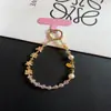 Cadena Creativa para Teléfono Móvil con Temática de Texto, Cuentas de Cristal de Aleación, Correa de Muñeca, Colgante Rojo de Año Nuevo