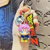Llavero de coche de Dragon Ball de dibujos animados, exquisita y linda muñeca Saiyajin, colgante para mochila escolar, pequeño regalo creativo