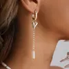 Collar de Cadena para Clavícula Ins Elegante Versátil con Borla de Corazón en Forma de U, Cuentas Cilíndricas Geométricas, Joyería Transfronteriza Europea y Americana para Mujeres