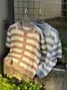 Camisa de punto a rayas azules y blancas de manga corta para hombre, estilo americano de verano, holgada, casual, con un toque de alta gama